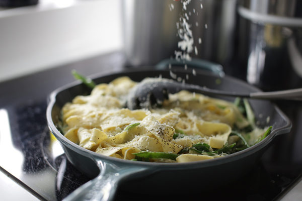 Fresh creamy tagliatelle with snap peas